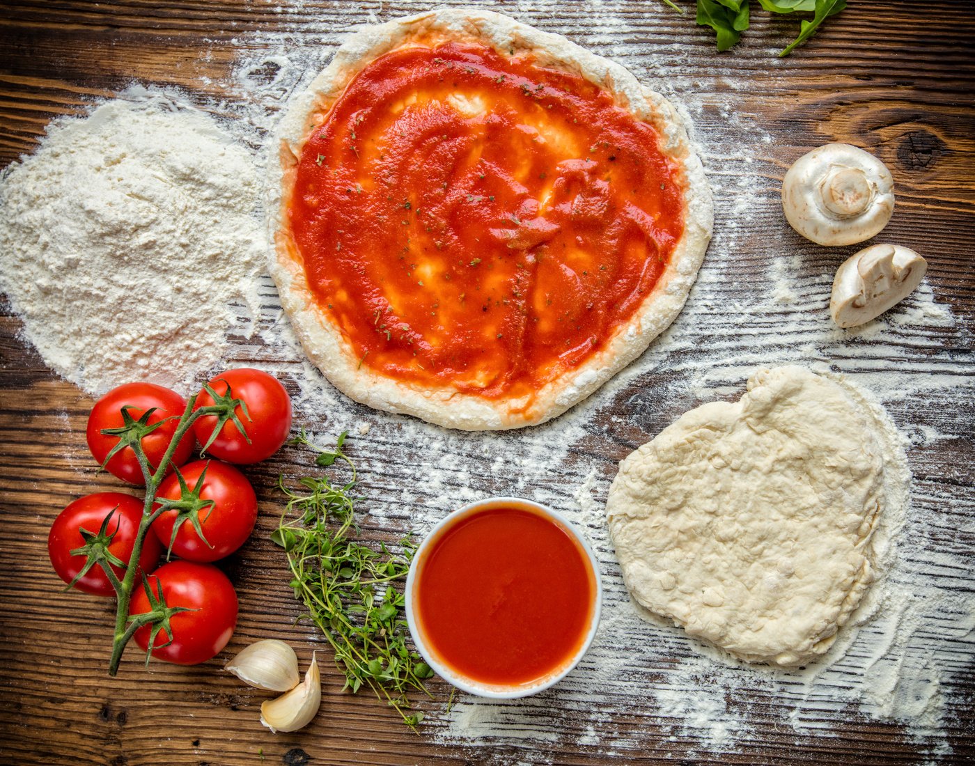 Pizza Dough with Tomato Sauce